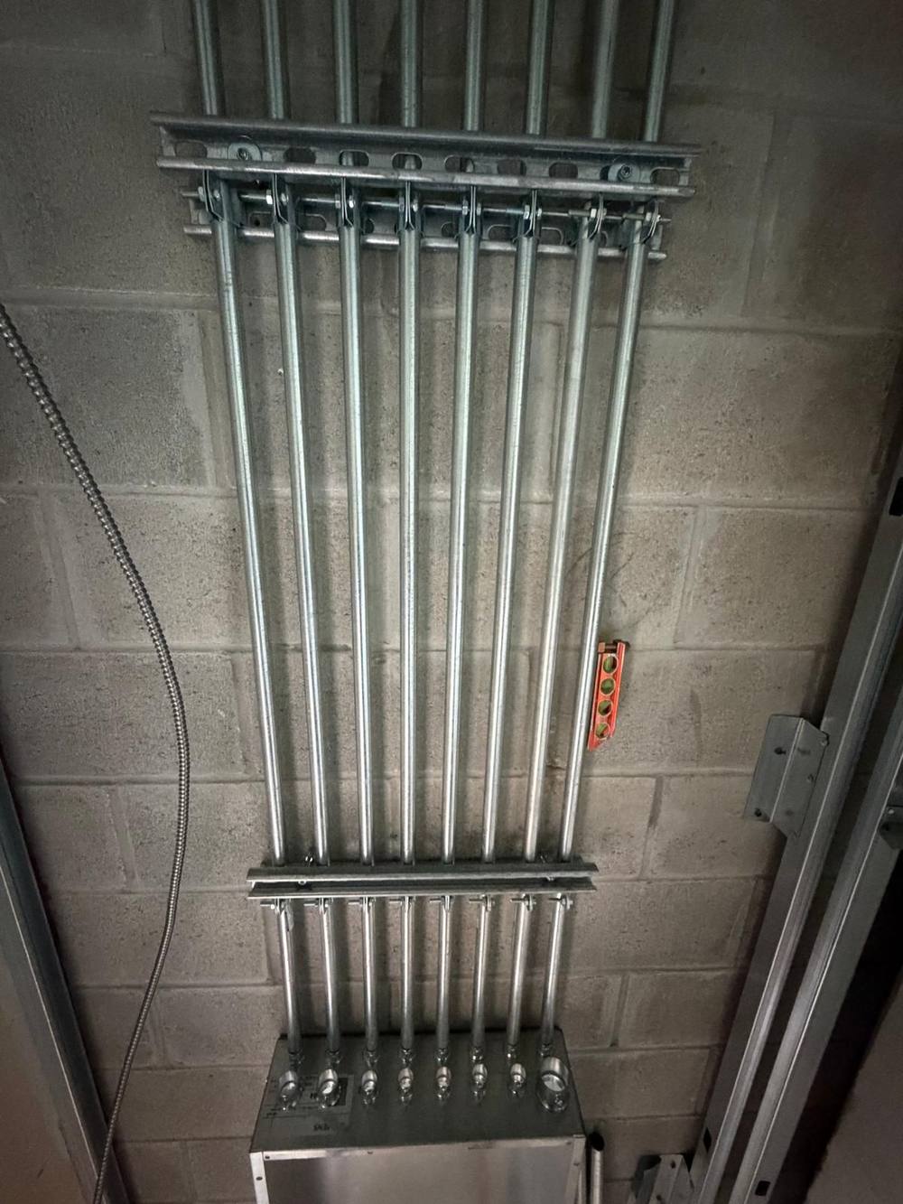Rigid conduit stub-ups for future panel installation